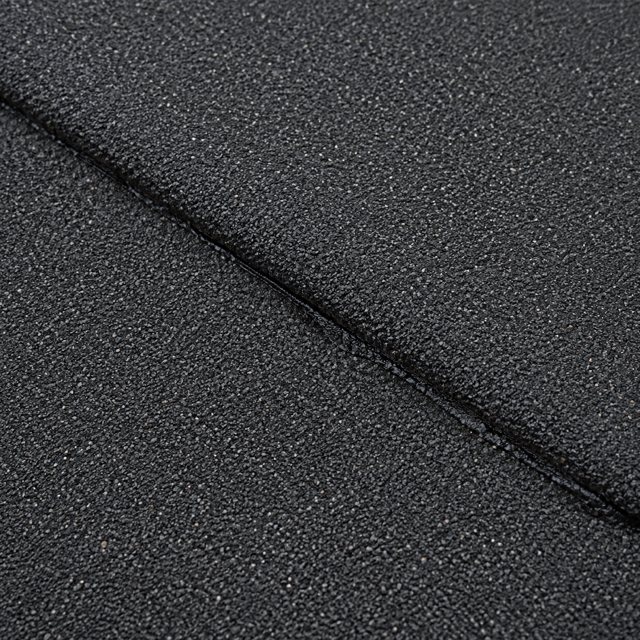 Close-up of torch-on felt roofing